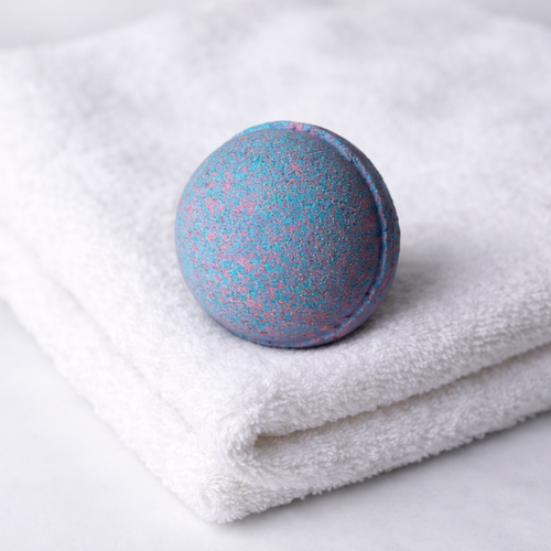 Blue and Pink Bath Bomb on a white towel